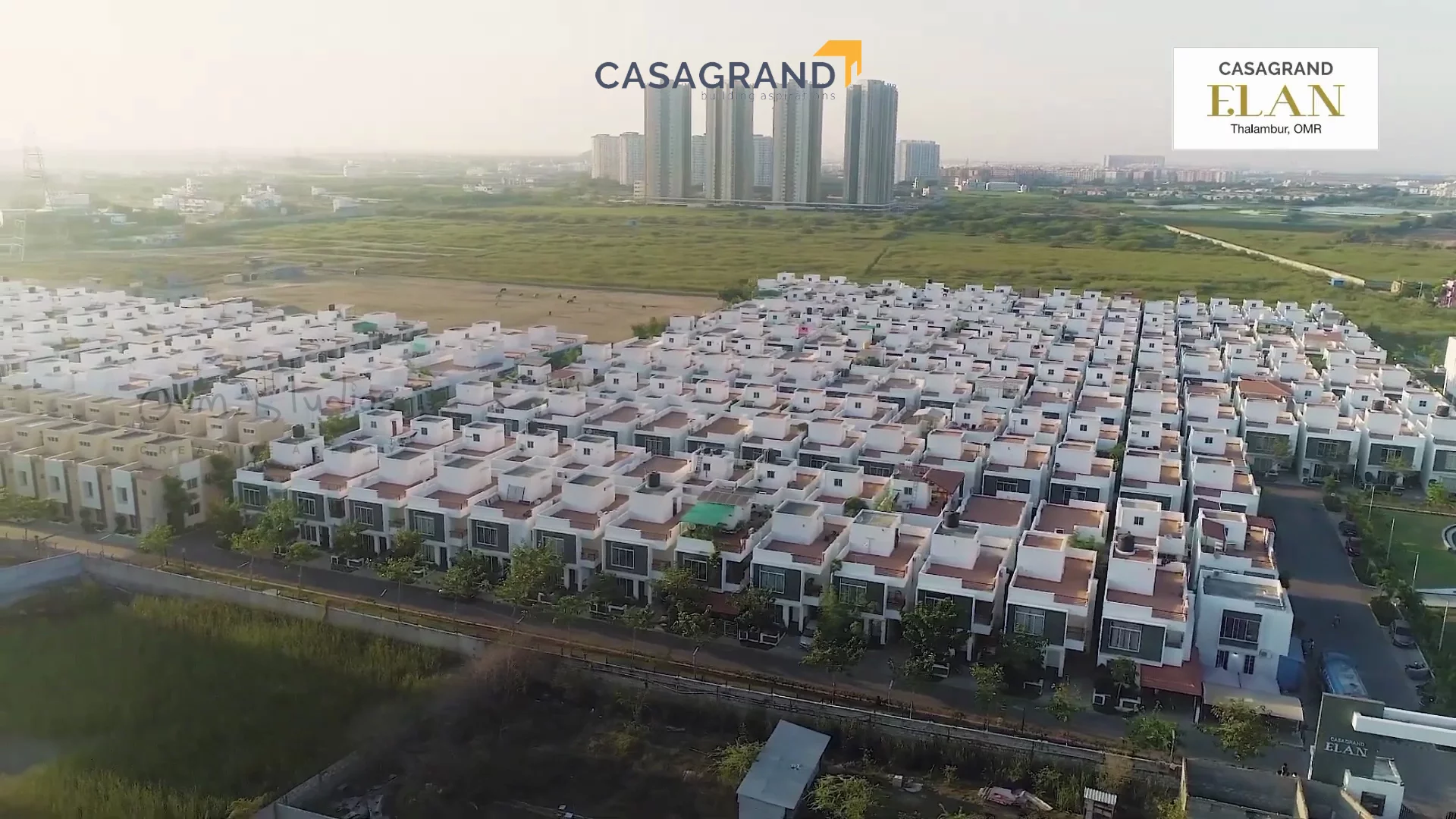 Aerial view of Casagrand Elan, a luxurious residential development in Thalambur, OMR, Chennai. The virtual tour property video showcases modern villas and row houses amidst lush greenery. #RealEstate #Chennai #CasagrandElan #LuxuryLiving #virtualtour #propertyvideo