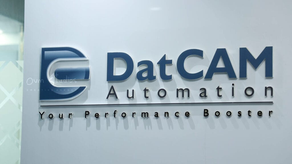 DatCAM Automation logo showcasing performance booster tagline