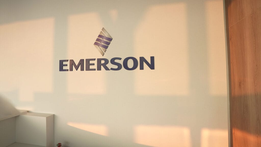 Emerson logo displayed on an interior wall with warm lighting.